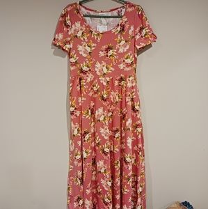 Lularoe cute short sleeve dress with floral pattern.